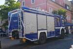 =MB Axor 1829 vom THW Ortsverband Hünfeld, mit Rosenbauer-Aufbau, steht beim Tag des Blaulichts 2023 in Hünfeld.