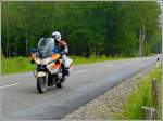 Luxemburg Radrundfahrt 2012. Als erste Fahrzeuge kommen einzelne Polizei Motorräder auf der vorgegebenen Tagesstrecke. 02.06.2012