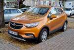 Opel Mokka X in Amber Orange.