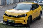 Der neue Ford Capri als elektro-SUV in der Farbe  Vivid Yellow , gesehen in 07.2025.