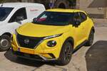 Nissan Juke Hybrid, gesehen auf einem Parkplatz. 03.2026