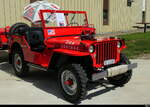 Ein Roter Willys Jeep zu Besuch am Oldtimer Treff auf den Areal des Flugplatz in Bleienbach am 14.06.2026