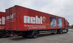 =MAN-Sattelzug des Möbelherstellers NEHL steht zur Fahrerpause auf dem Rasthof Fulda-Nord im Januar 2022