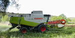 Claas Lexion 550, M�hdrescher bei der Ernte von Hirse in der Rheinebene im Breisgau, Sept.2026
