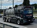 Ein MAN mit Absetzcontainer von Zaugg am 11.9.25 beim Grauholz.
