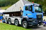 Ein MAN mit Abrollcontainer Aufbau von Stucki am 29.8.26 beim Diemtigtaler Truck Treff.