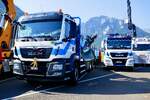 Zwei MAN von Egli Transporte am 27.6.26 beim Trucker Festival Interlaken.