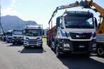 MAN Holztransporter und Scania von Egli Transporte am 26.6.22 beim Trucker Festival Interlaken.