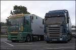 GARTNER KG: MAN TGA 18.440XXL von GARTNER INTERTRANS HUNGRIA steht mit einem Thermoauflieger neben einem Scania R420 aus Portugal. (22.06.2009)