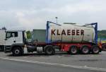 Klaeser Spedition hier ein MAN TGA LX wei/grau mit 30 ft Trailer mit 20 ft Tankcontainer KLAESER in Herten am 13,09,2012