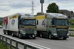 Ein MB Actros H�ngerzug und DAF Sattelzug von Camion Transport am 10.9.26 bei Grauholz.