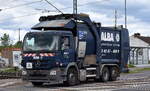 Alba Recycling GmbH - ALBA Group mit einem älteren MB Müllentsorgungsfahrzeug am 18.04.24 Höhe Bahnübergang Bahnhof Rodleben.