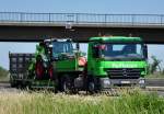 MB Actros mit Fendt Traktor auf dem Tieflade-Sattel - A61 bei Miel 28.06.2011