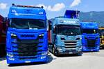 Zwei Scania von Rutrans und ein Scania im Auftrag von Planzer am 27.6.26 beim Trucker Festival in Interlaken.