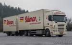 Scania R380 Tandem-Hängerzug von  Selman  aus den Niederlanden pausiert auf dem Rasthof Feuchtwangen, 31.12.2013