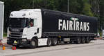 =Scania-Sattelzug von FairTrans steht im Juli 2019 auf einem Rastplatz an der A 7