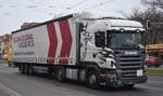 Scan Global Logistics A/S mit einem polnischen Sattelzug mit SCANIA R 420 Zugmaschine am 24.01.23 Berlin Karlshorst.