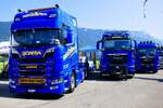 Ein Scania Sattelzug und zwei MAN von Car Barras am 27.6.26 beim Trucker Festival Interlaken.