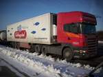 Dieser Dänische Scania-LKW mit norwegischen Sattelzug stand am 23.Januar 2010 im Fährhafen Sassnitz-Mukran.