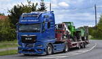 KRAUSS Transport + Logistik GmbH mit einem Schwerlasttransport (Baumaschinen) mit Tiefladebrücke u.