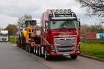 Volvo FH16 750 mit Caterpillar 980M Radlader am 14.03.26 am A3 Rasthof Weisskirchen Nord