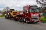 Volvo FH16 750 mit Caterpillar 980M Radlader am 14.03.26 am A3 Rasthof Weisskirchen Nord