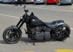 Auf einem Parkplatz ist mir diese schöne schwarze Harley Davidson am 14.09.2012 aufgefallen.