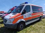 =MB Sprinter als Bevölkerungsschutzfahrzeug im Dienst des DRK RHEIN-SIEG, steht auf dem Parkplatz der RettMobil 2025