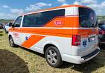 =VW T5 vom WEISSEN KREUZ aus Italien, gesehen auf dem Parkplatz der 2025er Rettmobil in Fulda