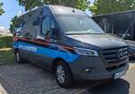 =MB Sprinter der Firma STOLLENWERK, einem Unternehmen für z. B. Transportlösungen im Rettungsdienst, steht auf dem Parkplatz der RettMobil im Mai 2025