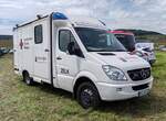 =MB Sprinter der ZELK= Z entrale E inrichtung L andesvorhaltung K atastrophenschutz des Landes Rheinland-Pfalz im Dienst des DRK steht auf dem Parkgelände der Rettmobil 2024 in Fulda.