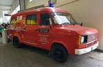 =Ford Transit, ein ehemaliges Feuerwehrfahrzeug, nun als Durstlöscher. Gesehen in der Ausstellungshalle der Technorama 2023 in Kassel
