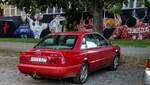 Rückansicht: Audi A6 C4 in rot. Foto: 08.2021.