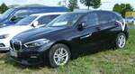 =BMW 118i von  sharenow , einem deutschlandweit agierenden Carsharingunternehmen, steht auf dem Parkplatz der RettMobil 2022 in Fulda, 05-2022 