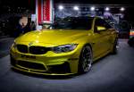 Anspruchsvoll getunter BMW M4 (3er Coupé)  Work Wheels , gesehen auf dem Auto Zürich, November 2015.