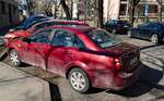 Rückansicht: Chevrolet Lacetti Sedan in Arizona Rot (oder Red Rock). Foto: 02.2022