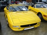 Ferrari F355 GTB Berlinetta. 1994 - 1999. Hier wurde ein Coupe Modell im seltenen Farbton 
giallo Modena abgelichtet. Der V8-motor hat einen Hubraum von 3495 cm³ und leistet 381 PS. Die Höchstgeschwindigkeit liegt bei 295 km/h. Classic Remise Düsseldorf am 06.11.2016.