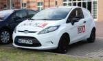 Ford Fiesta von XXXL auf einem Parkplatz in Schwerin, August 2014