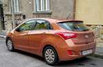 Rückansicht: Hyundai i30 mk2 in der Farbe  Orange Caramel . Foto: 12.2020.