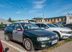 Hier ist ein Nissan Primera Mk1 in der Farbe Sherwood Green zu sehen. Die Aufnahme stammt von M�rz, 2026.