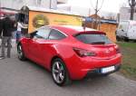 Opel Astra GTC, fotografiert am 31.03.2012, Besucherparkplatz, Tuning Show.