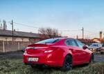 Rückansicht: Opel insignia Turbo Liftback in Rot. Foto: 11.2021.