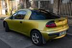 Rückansicht: Opel Tigra Mk1 in Brokatgelb (Curry Yellow auch genannt).