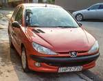 Peugeot 206 in Orange, fotografiert in Sommer, 2019, Pécs (HU).