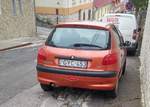 Rückansicht: Peugeot 206 in orange, fotografiert in Oktober, 2019.