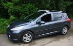 Peugeot 207 SW Urban Move steht in Aachen-West am Abend des 28.6.2013.