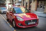 Roter Suzuki Swift mit passendem Kennzeichen :).