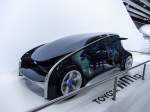 Hier ist einen Concept e-Auto von Toyota (iiMo) zu sehen.