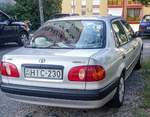 Toyota Corolla E110 (Sedan, Rückansicht), aufgenommen in August, 2019.