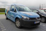 VW Caddy der Firma  Müller , gesehen im Biebergemünd im April 2016